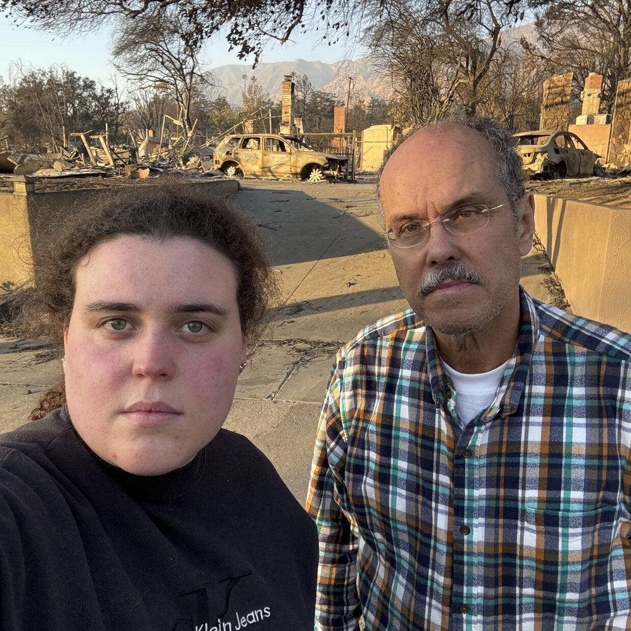 A dad and daughter help evacuees learn whether their homes survived the California wildfires